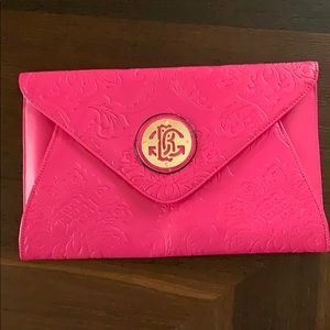 Pink women designer clutch.